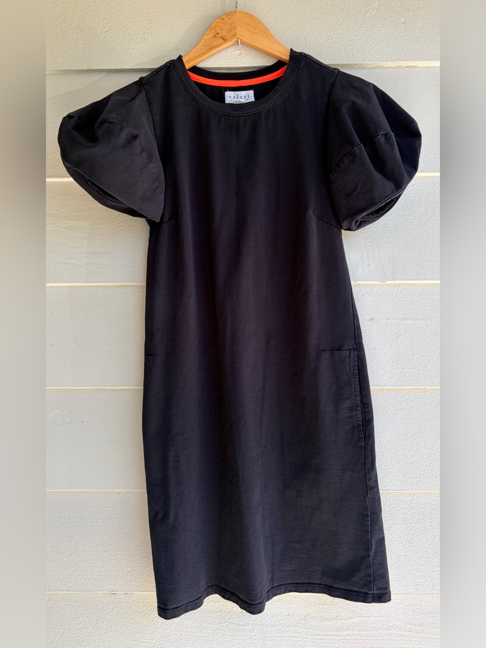 Velvet Brand’s “Jolene” Black Mini Dress From Anthropologie. With pockets
